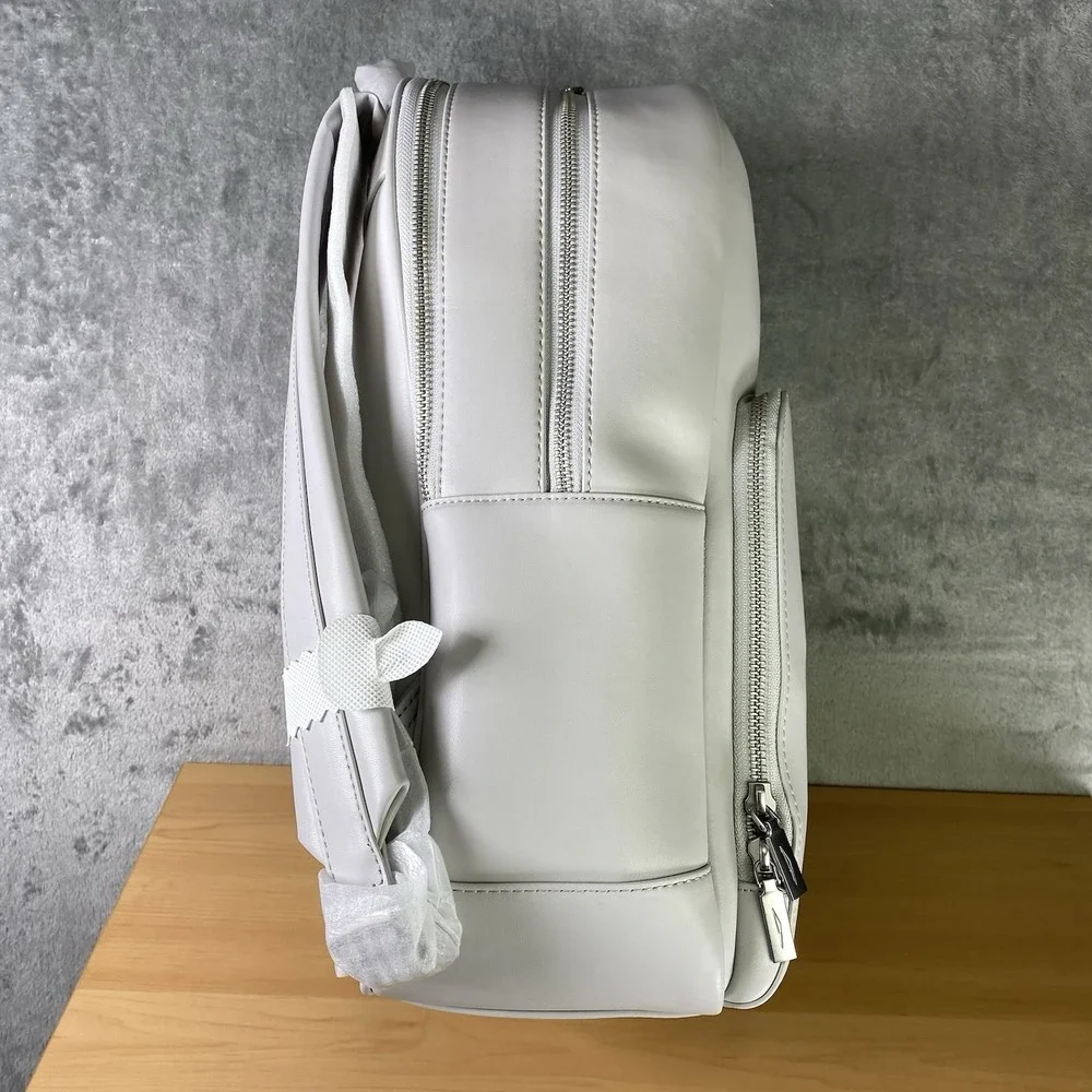 Tesla Cybertruck Elevate Backpack Grey Vegan Leather Tesla Store w/ Satin Cover‎